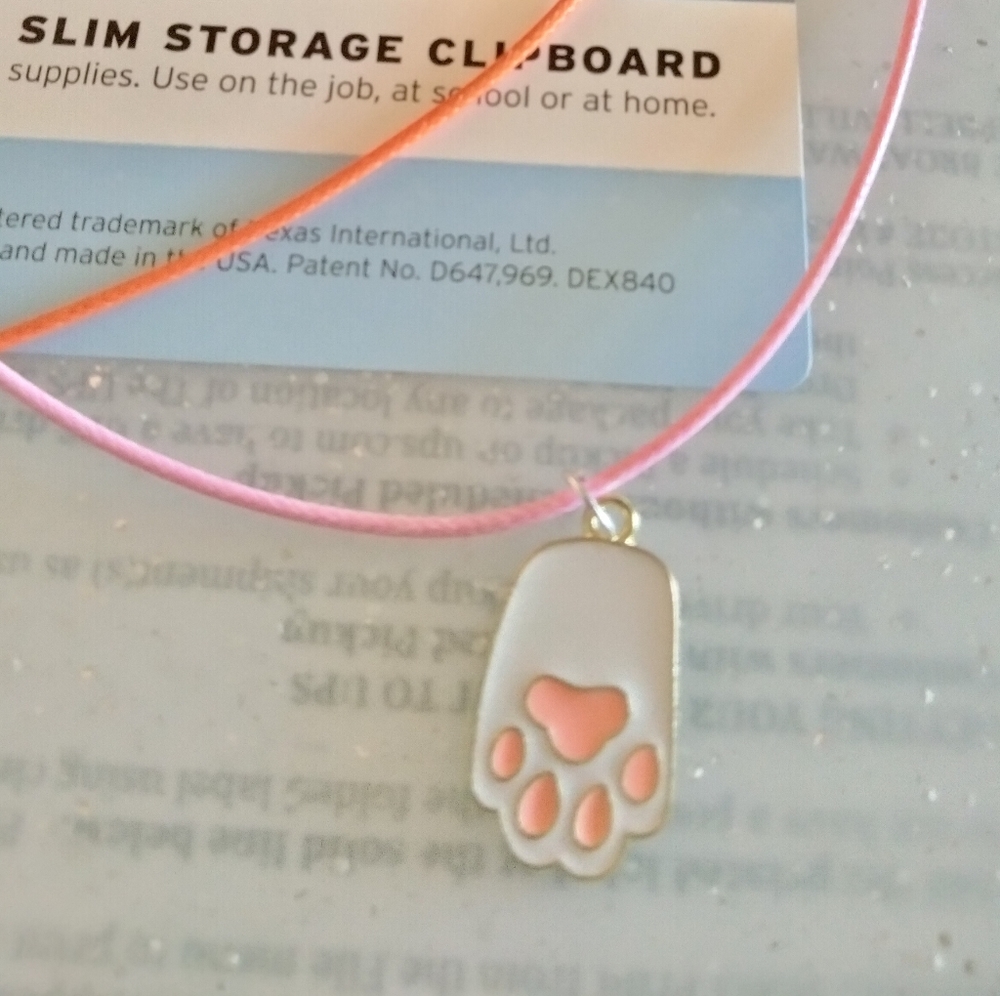 Bunny Paw on a color corded necklace